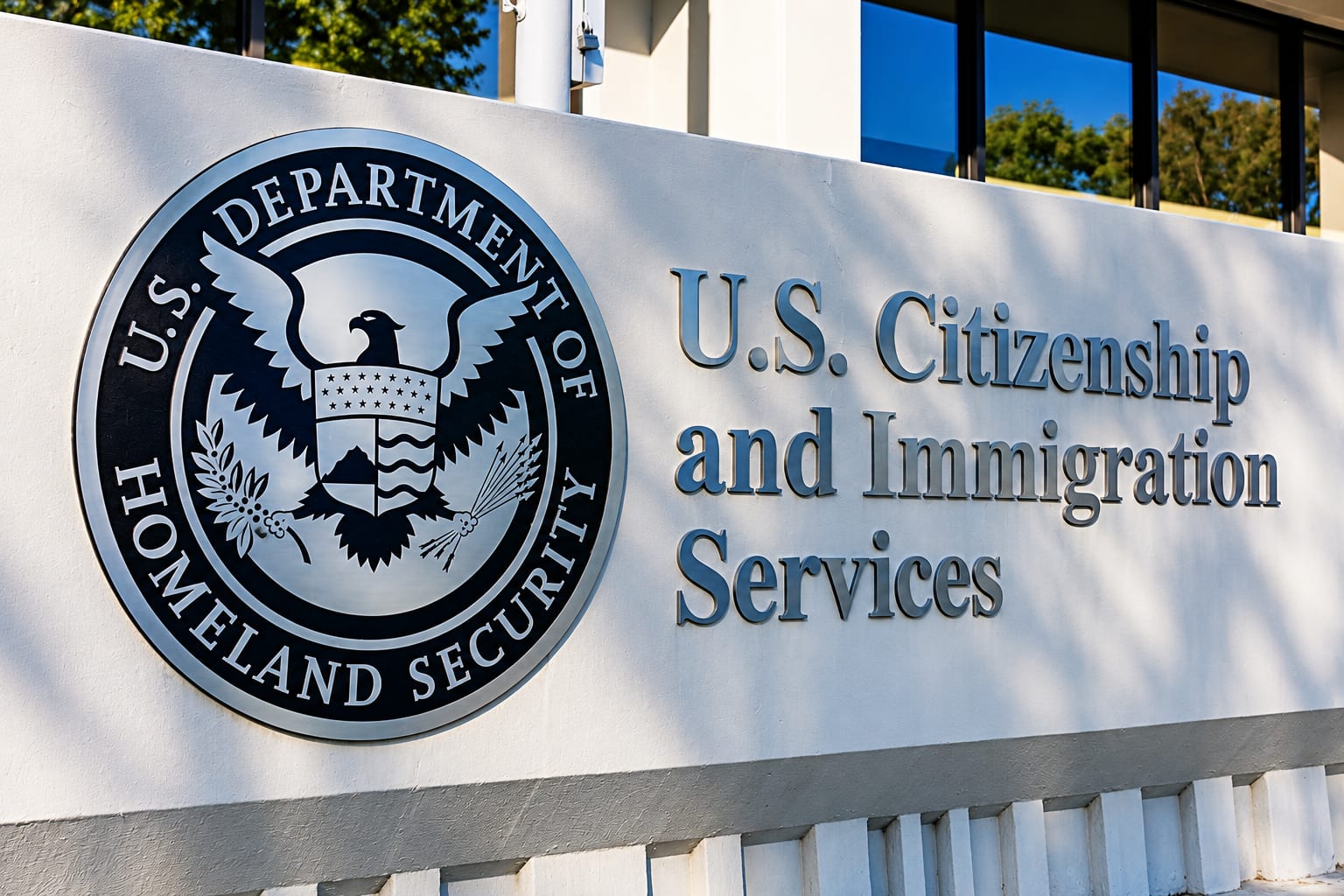 Illustrative U.S. Citizenship and Immigration Services sign outside a building